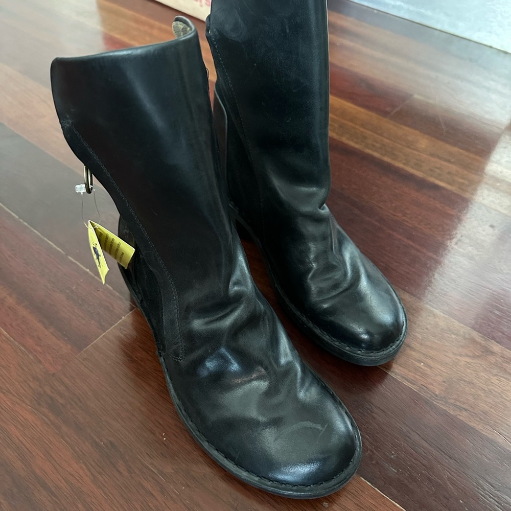 Fly London black leather boots, soles are unworn and leather is in great shape